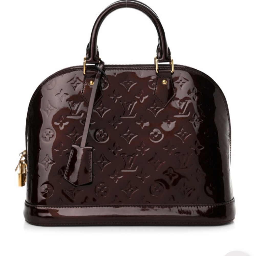 LOUIS VUITTON 
Vernis Alma PM Amarante